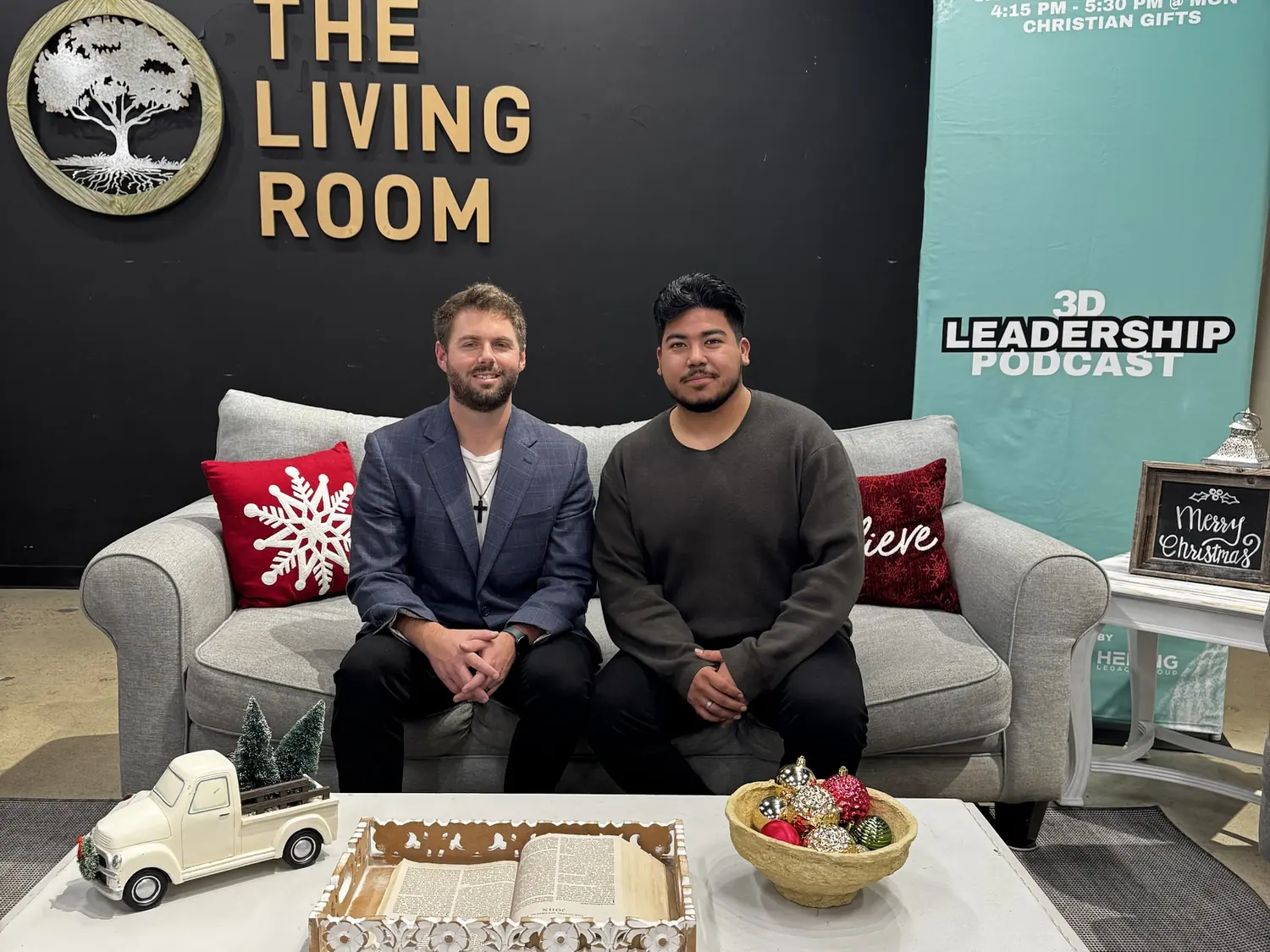 Dennis Hering and co-host Danny Ayala seated on a studio couch next to the 3D Leadership Podcast banner